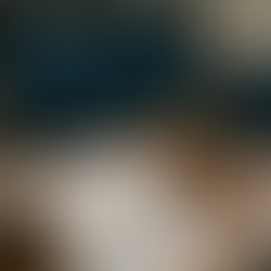 Ultra-realistic workspace setup showing a printed sales data report with bar charts and pie graphs on a wooden desk, next to a pen and notebook, with two monitors displaying "Data Cleaning" dashboards and spreadsheet data; a silhouetted, faceless person sits in front, representing secure and anonymous sales data analysis for machine learning.