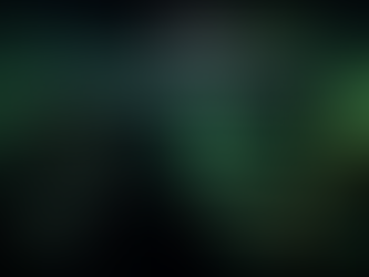 Django Python web framework code on ultrawide monitor in dark developer workspace.