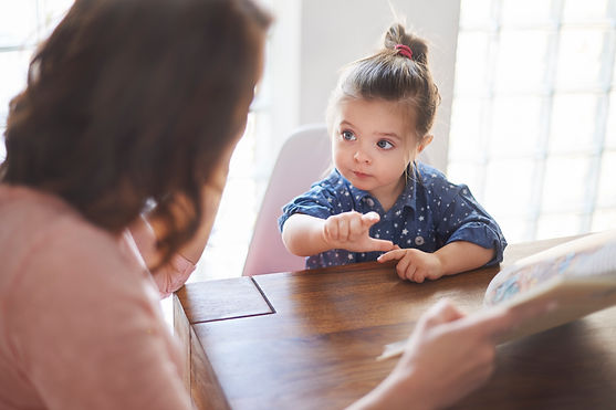 cute-girl-with-mom-reading-book.jpg