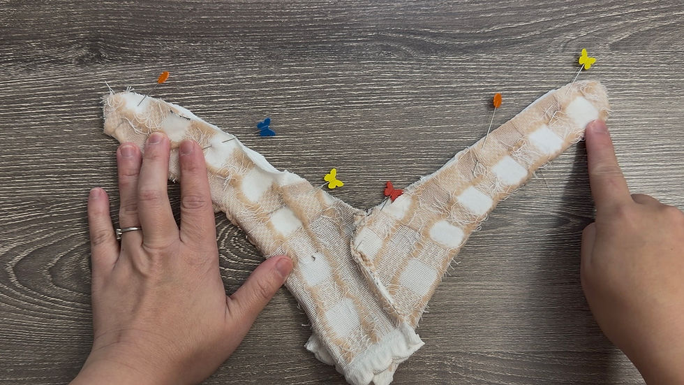 Pin or clip in place, making sure the crotch seams meet.
