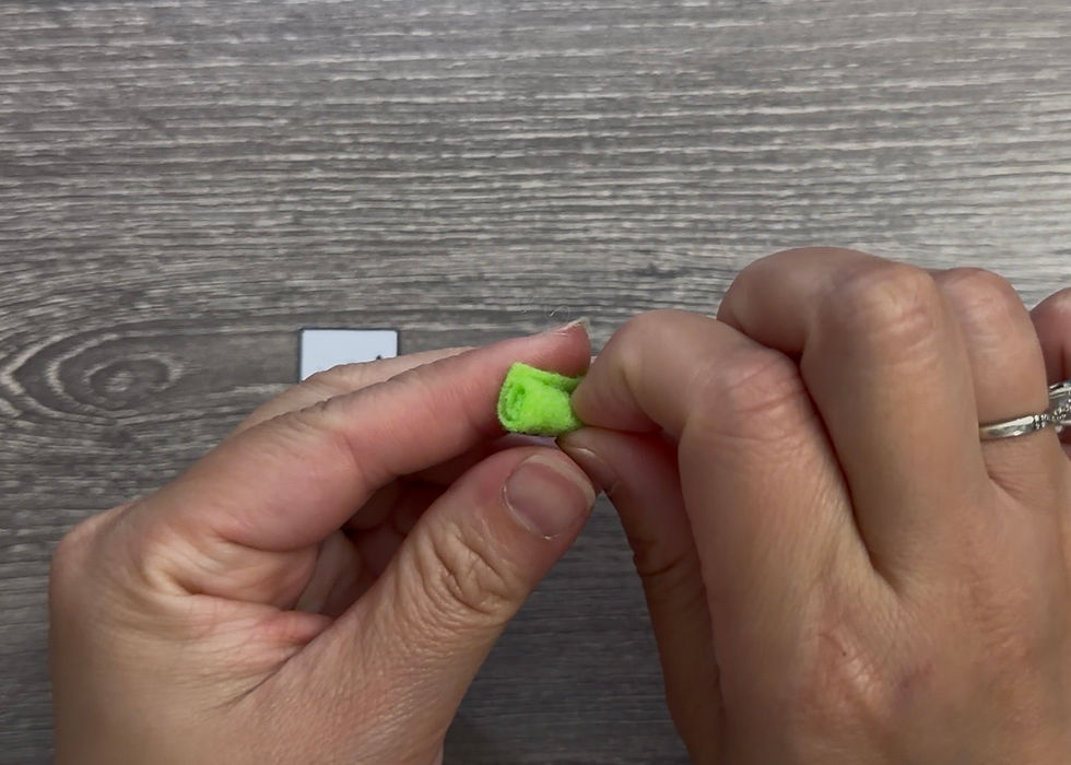 Roll the green stem piece tightly.