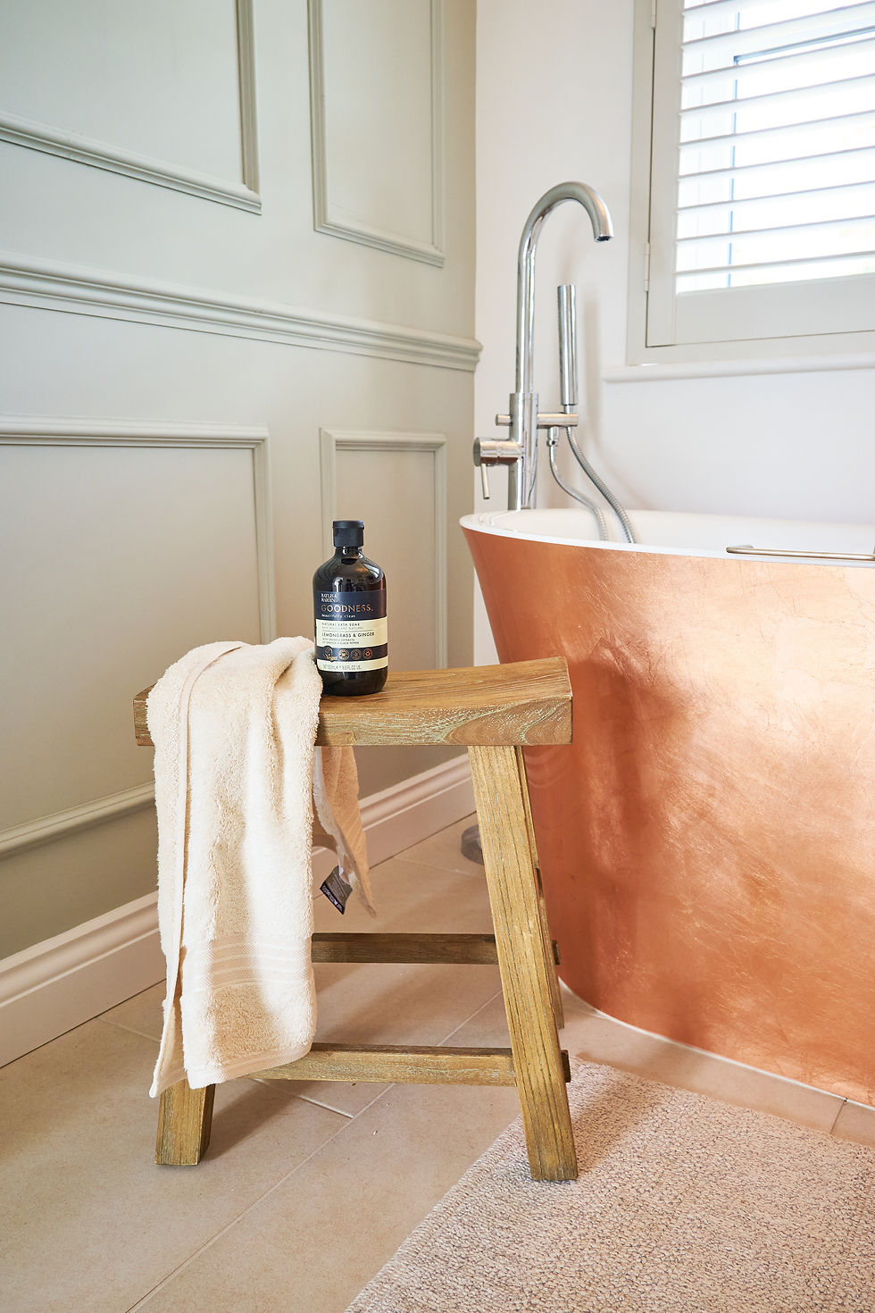 A modern traditional en-suite bathroom interior styling