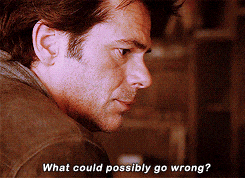 Man in a dimly lit room with a concerned expression. Text on image: "What could possibly go wrong?" Earthy tones set a tense mood.
