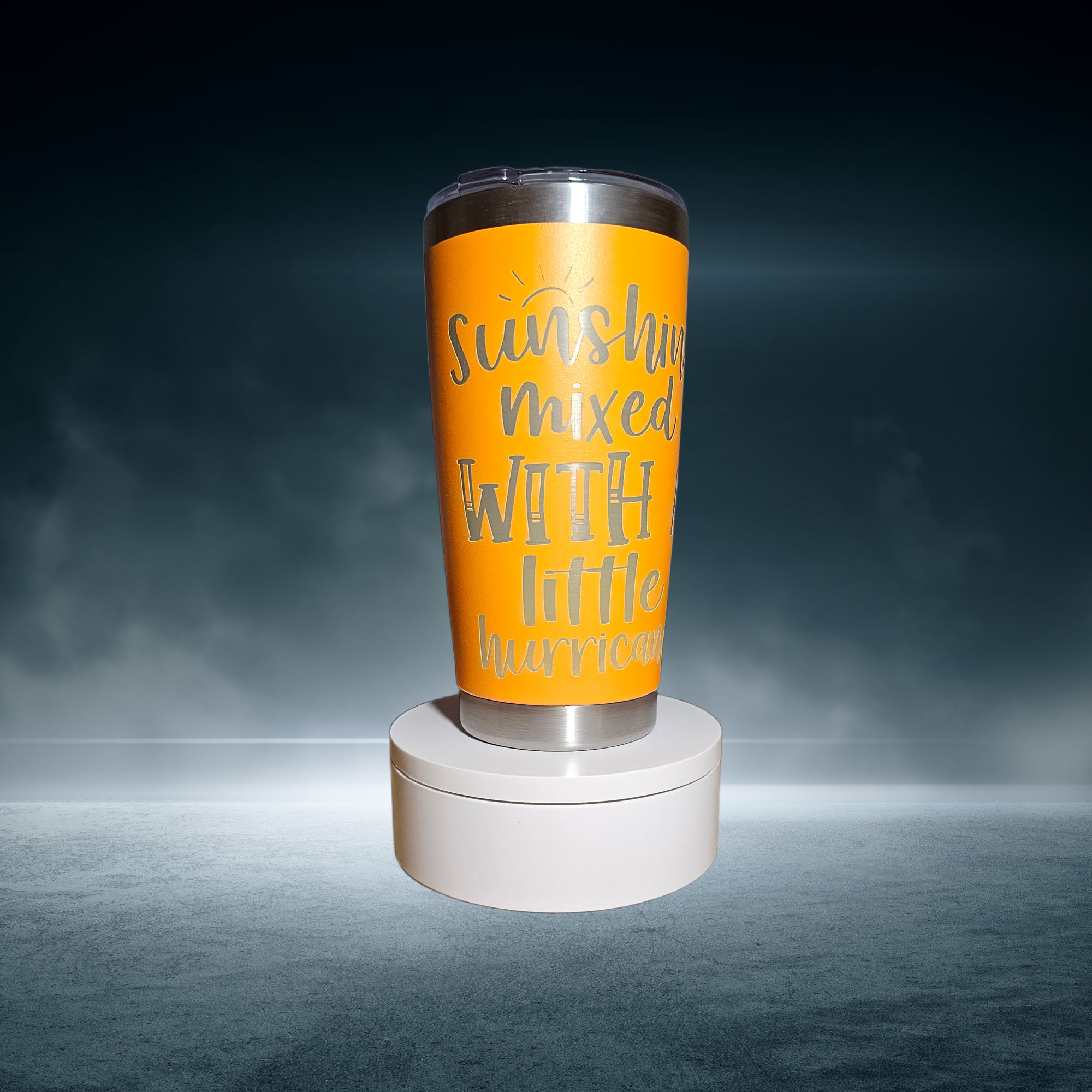 20oz tumbler laser engraved with a sunshine and hurricane design