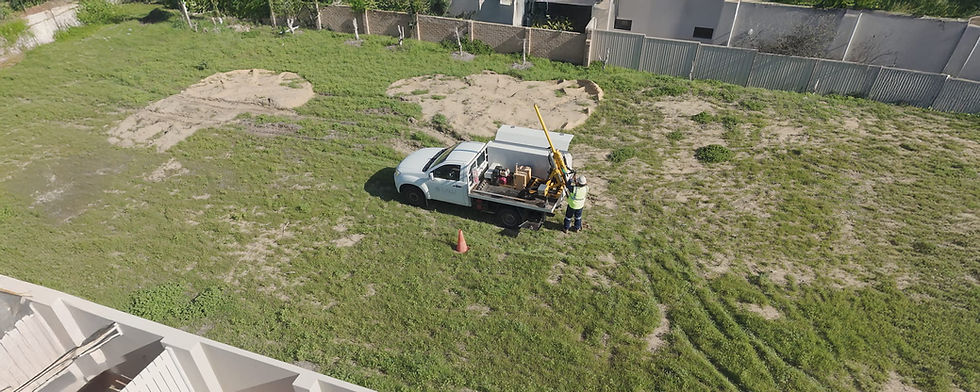 Workers unloading equipment near residential area