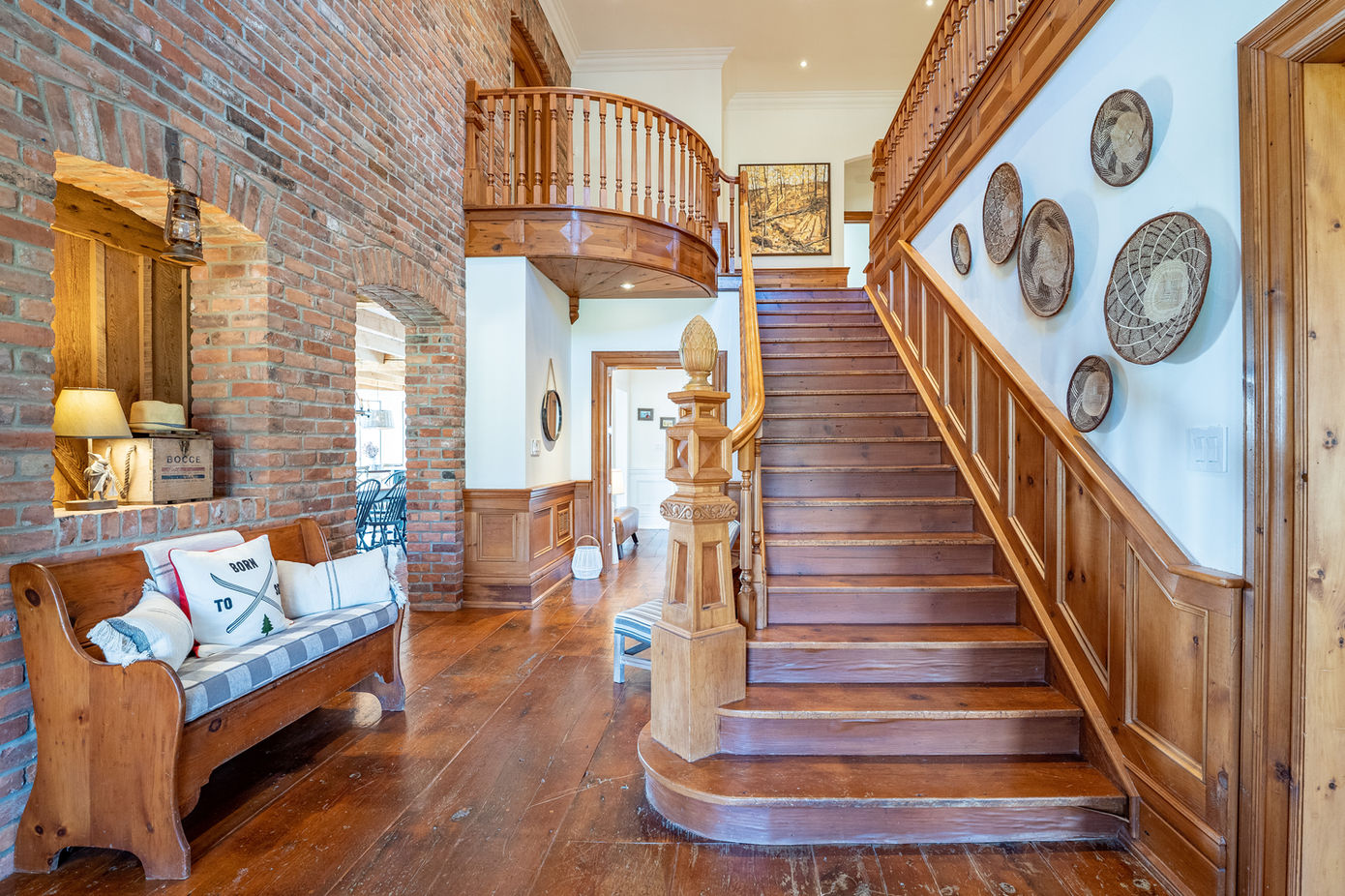 Grand wooden staircase in a rustic home