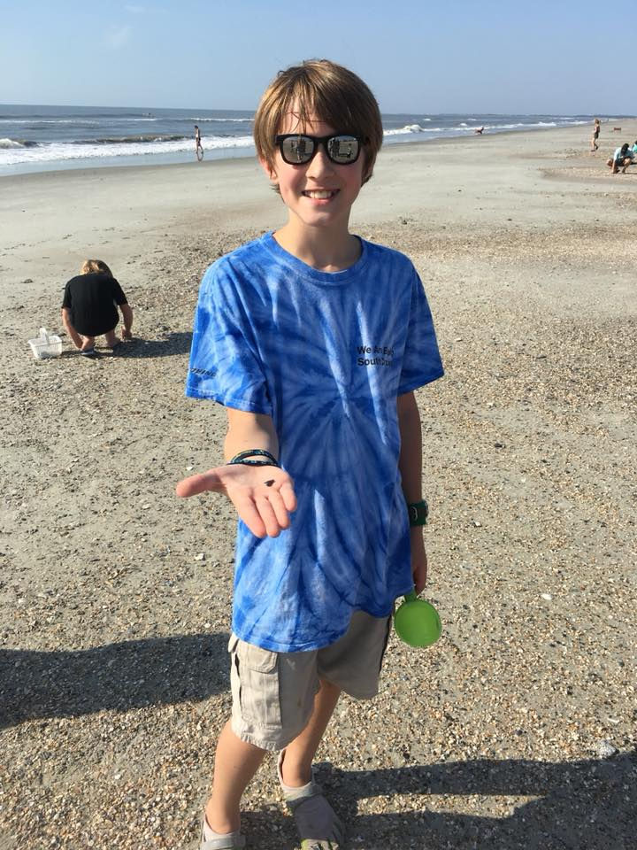 Sullivan and his tiger shark tooth!