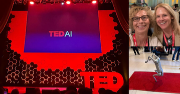 TEDAI stage with red lighting and hexagonal patterns. Two women smiling with TEDAI badges. A small robotic dog on a red carpet.