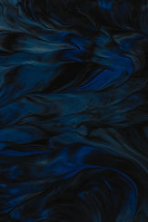 An experimental acrylic paint pouring project with a balloon rolling over the canvas._edit