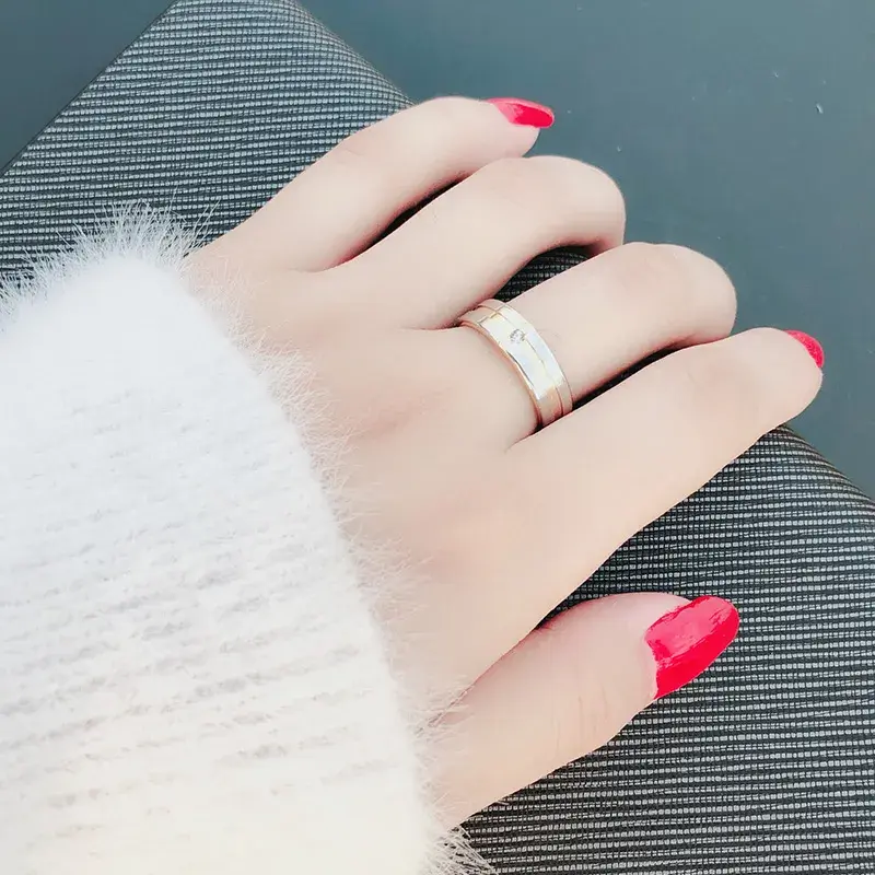 Miniatura: Anillo titanio cruz con cristal zirconia