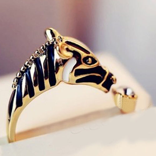 Miniatura: Anillo cabeza de caballo con cristal zirconia dorado