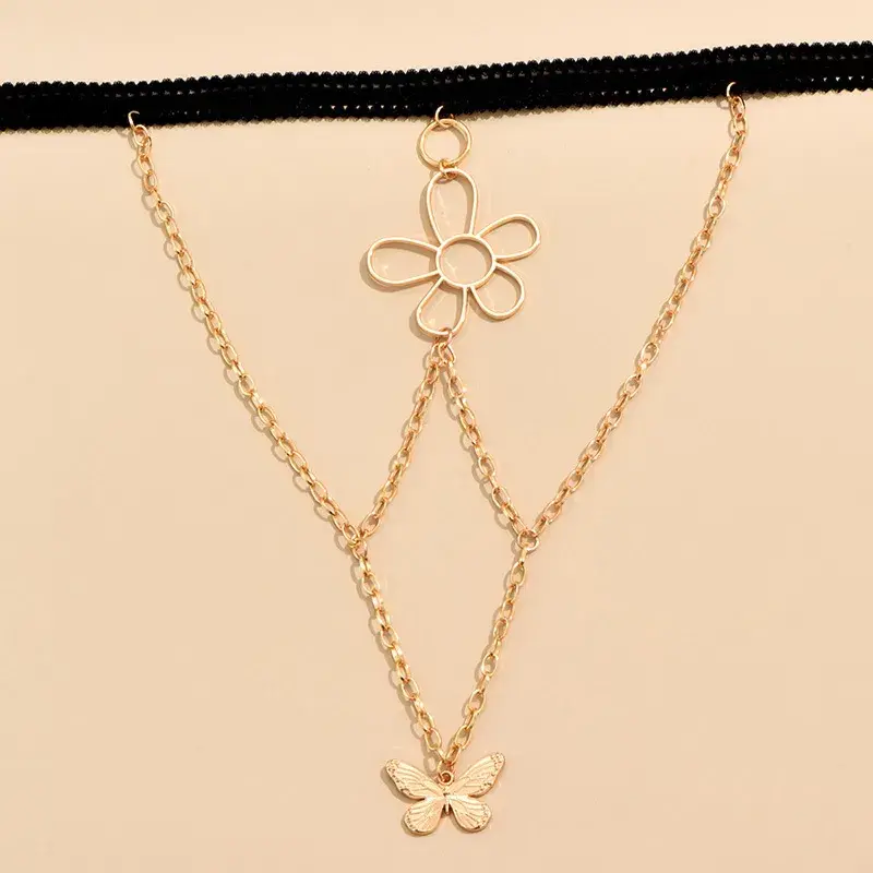 Miniatura: Cadena de pierna flor y mariposa