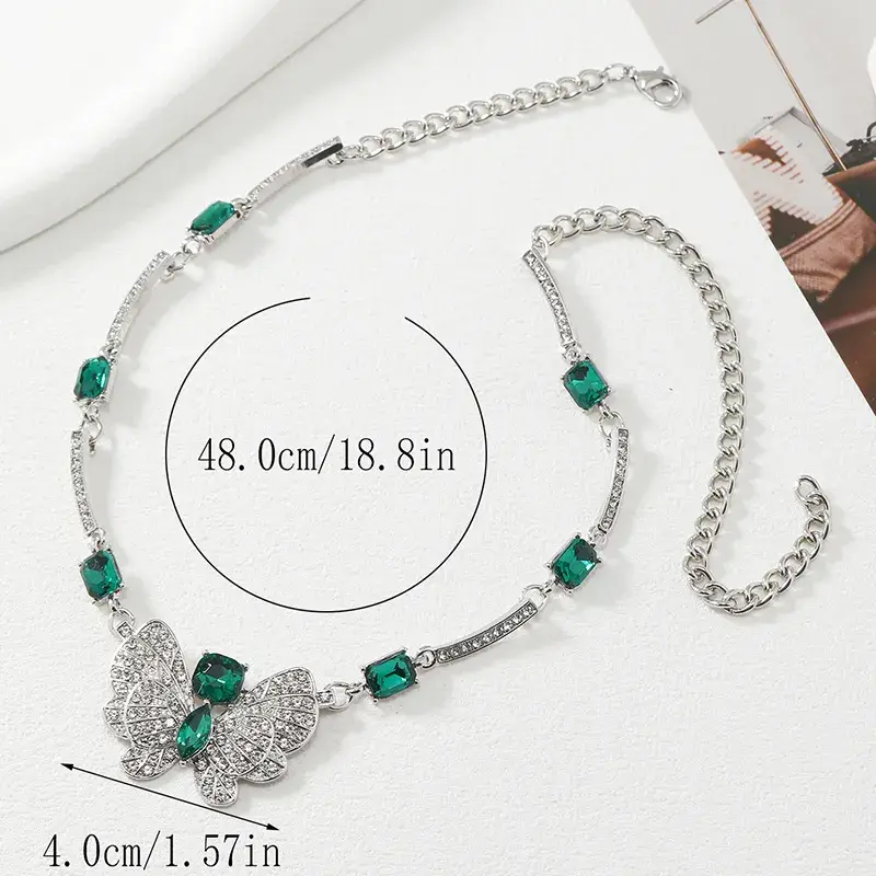 Miniatura: Conjunto collar y aretes mariposas esmeralda