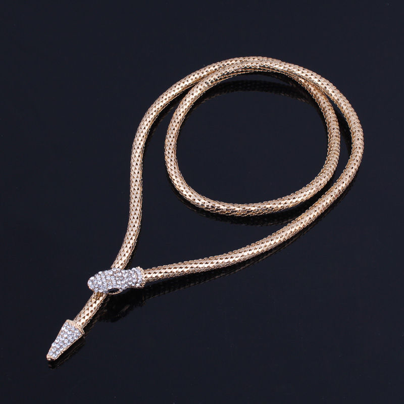 Thumbnail: Collar serpiente articulado oro pedrería y cristales