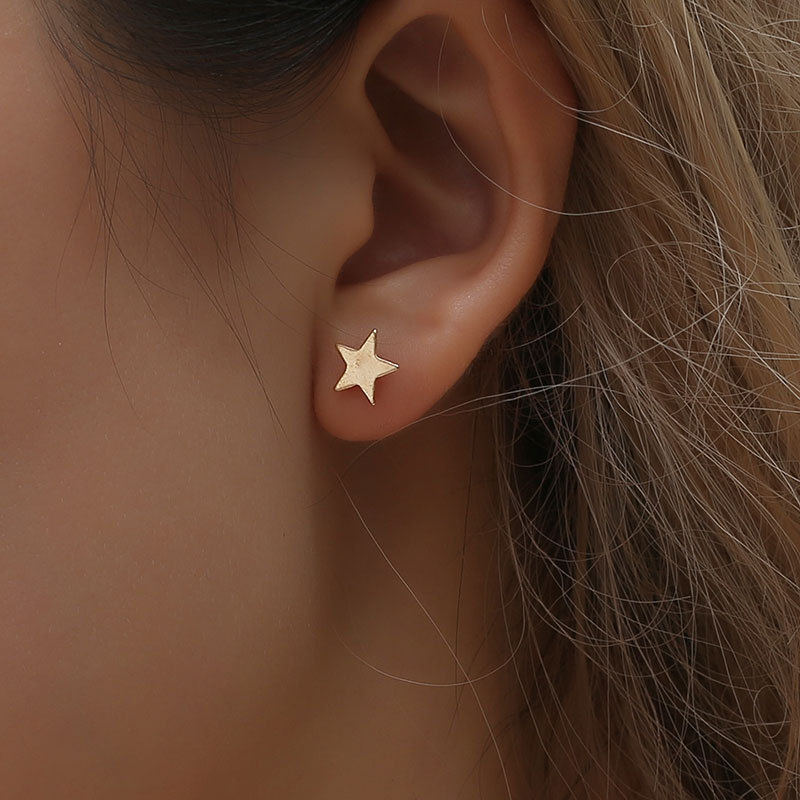 Miniatura: Aretes asimétricos luna y estrella gold filled