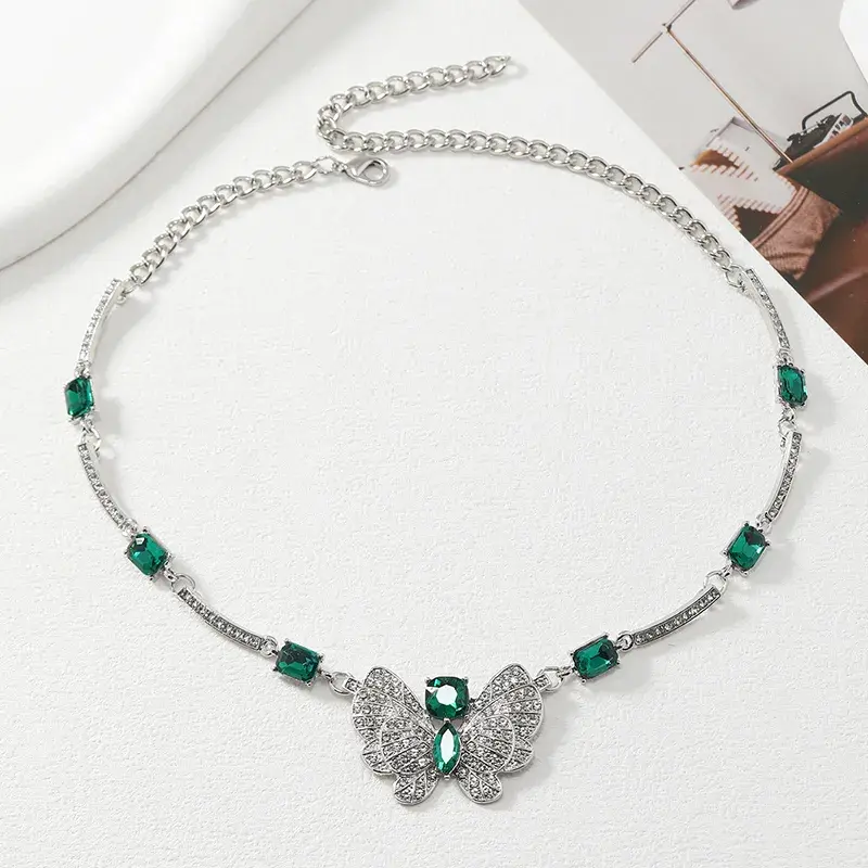 Miniatura: Conjunto collar y aretes mariposas esmeralda