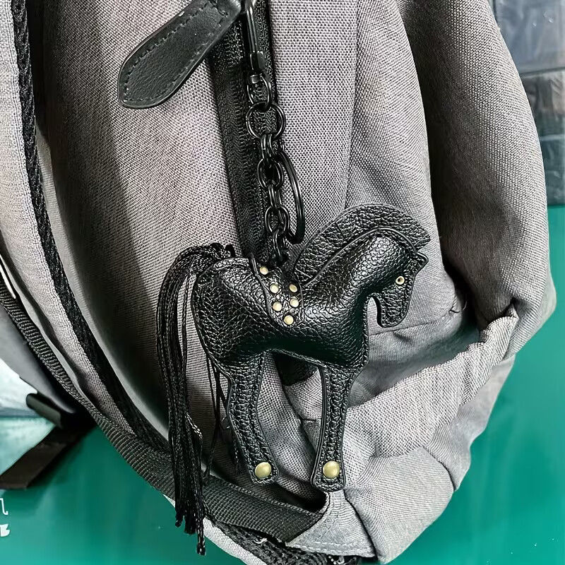 Miniatura: Colgante llavero de caballo de cuero sintético black