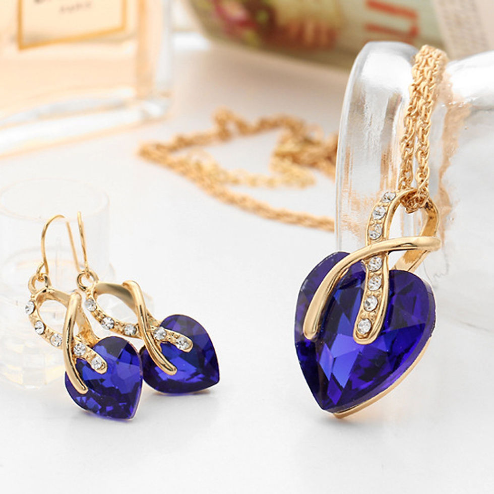 Miniatura: Conjunto collar y pendientes de corazones con cristales