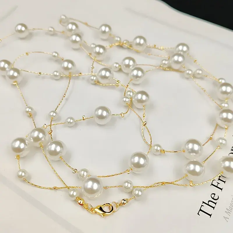 Thumbnail: Collar largo multicapa de perlas