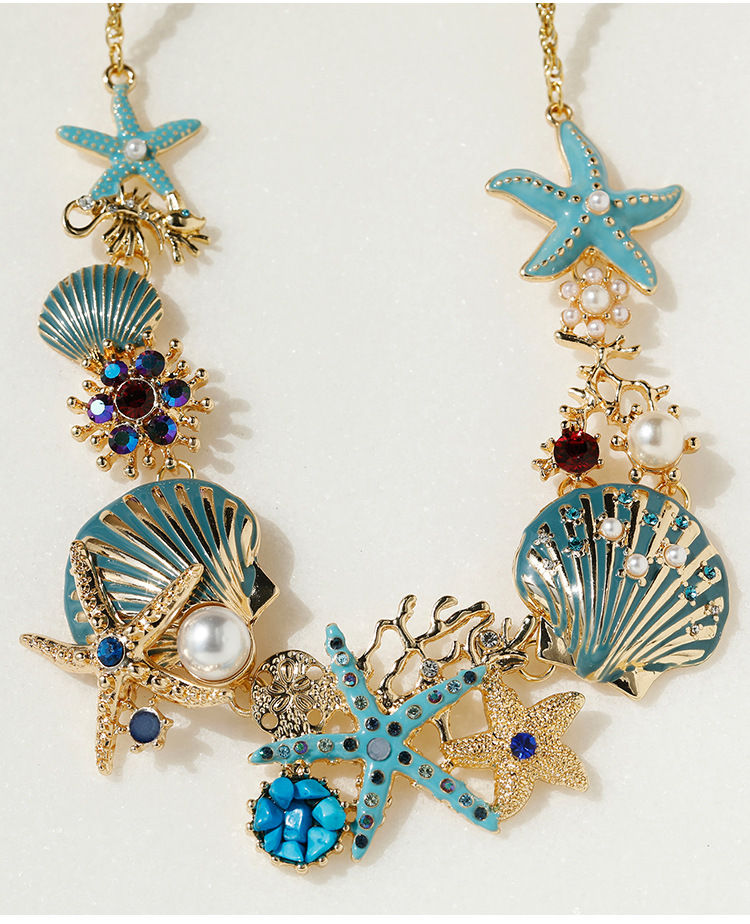 Miniatura: Collar con conchas y estrellas de mar