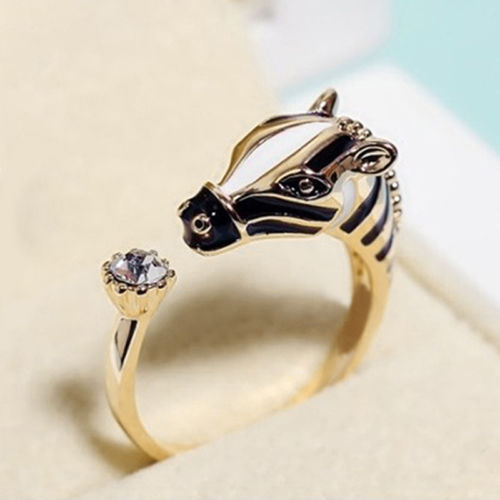 Miniatura: Anillo cabeza de caballo con cristal zirconia dorado