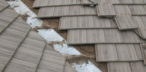 tile-roof-repair-2-e1512617926626.jpg