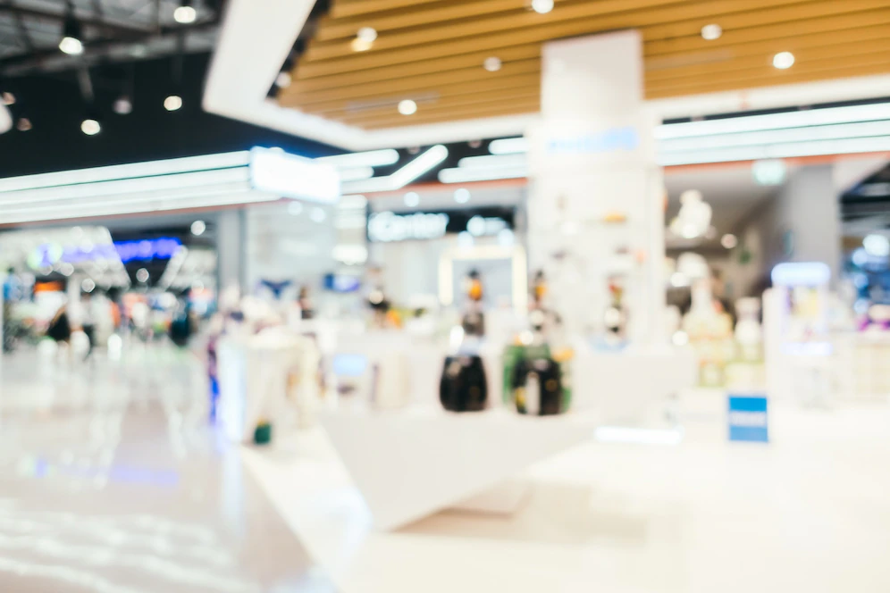 abstract-blur-bokeh-defocused-shopping-mall-interior-department-store_1203-9476.webp