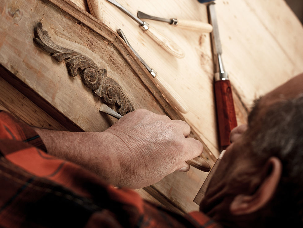 senior-carpenter-working-with-a-hammer-chisel-and-2025-02-11-14-54-56-utc.jpg