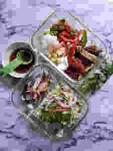 Food portioned in containers.