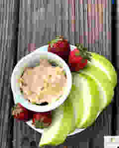 Apples and strawberries on a plate with mascarpone peanut butter dip