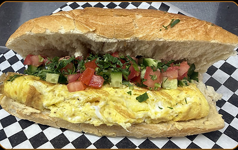 The Omelette! Fluffy omelette sandwich with humus and salads, sandwich or plate. Great for Breakfast, lunch or dinner