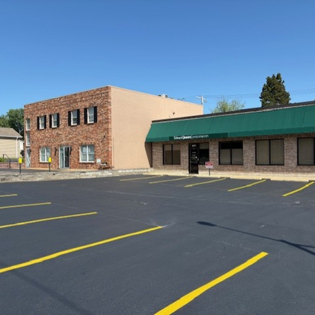 Crack filled, sealcoated and re-striped parking lot at a St. Louis based financial services firm.