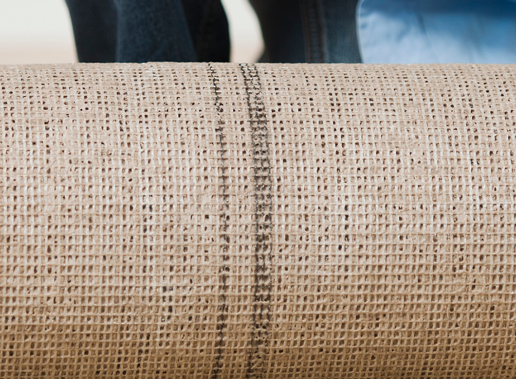 Woman Rolling Carpet