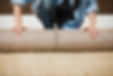 Woman Rolling Carpet