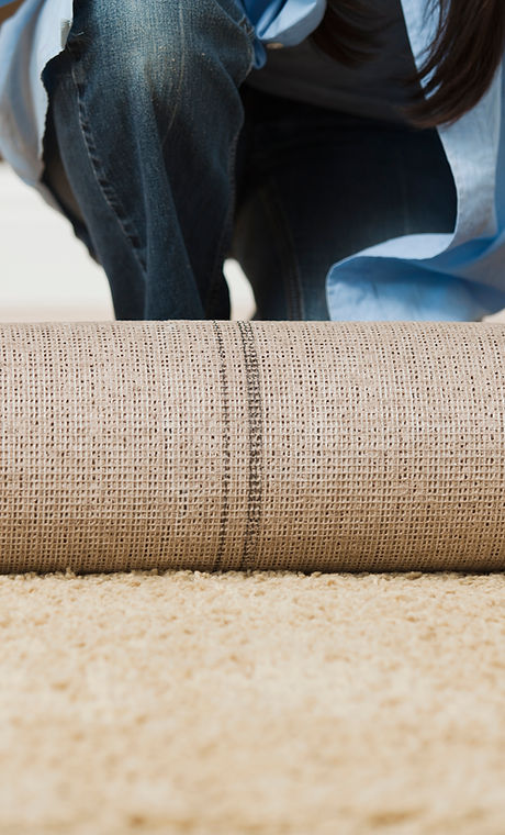 Woman Rolling Carpet