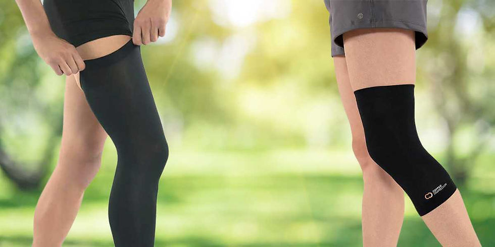 Two athletes wearing compression leg sleeves.
