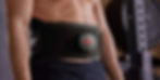Athlete using heat brace for back pain.