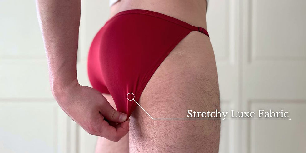 Demonstrating the stretchy luxe fabric of the HUNK FlexFit Briefs.