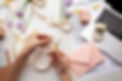 feminine-hands-creating-handmade-invitations.jpg