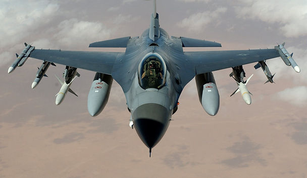 A fighter jet loaded with missiles