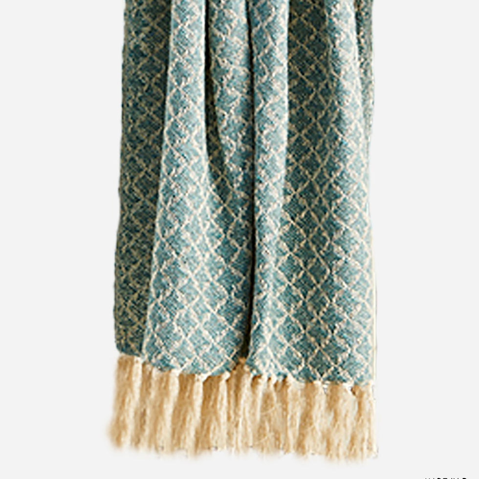 This Bermuda Blue cotton throw features a classic geometric pattern diamond weave and with thick end fringing.