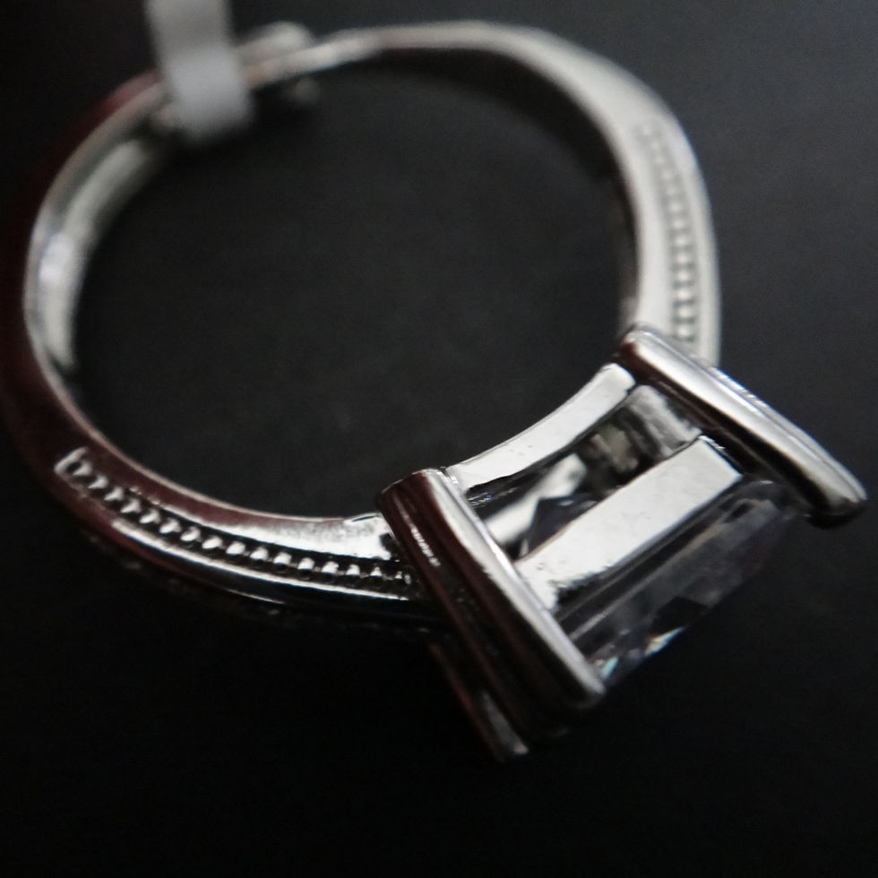 Thumbnail: Side view of Handcrafted Adjustable Square Stone Ring enhanced with elegant multi-faceted stones. with adjustable ring.