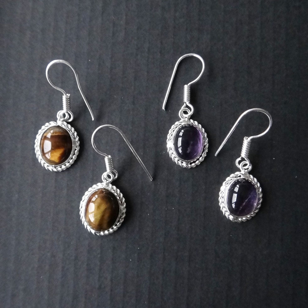 Thumbnail: Handcrafted Oval Crystal Drop Earrings with purple gemstone.