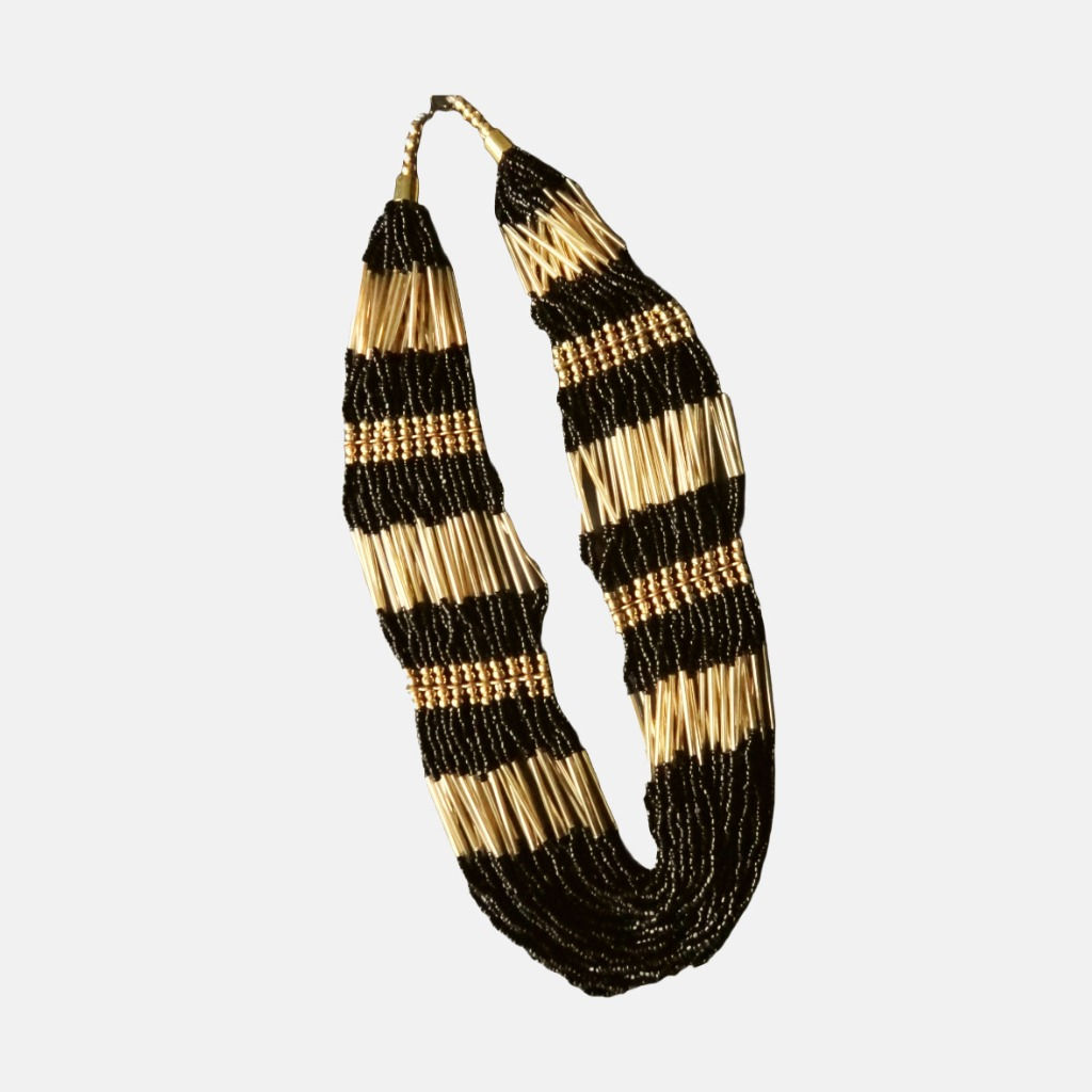 Handmade beaded necklace featuring layers of black and gold beads in alternating pattern.