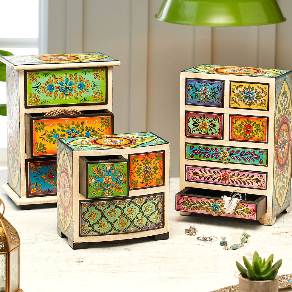 Thumbnail: Manya Hand Painted Drawer Mango Wood Chests featuring intricate hand painted florals all over with gold pull handle.