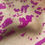 Thumbnail: Trendy abstract hand printed scarf featuring sploshes of bright pink against an earthy brown natural background.