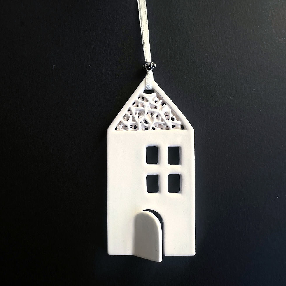 Thumbnail: Handmade Tangled House Hanging Decoration featuring hand cut-out windows and a half opened door, and filigree pattern roof .