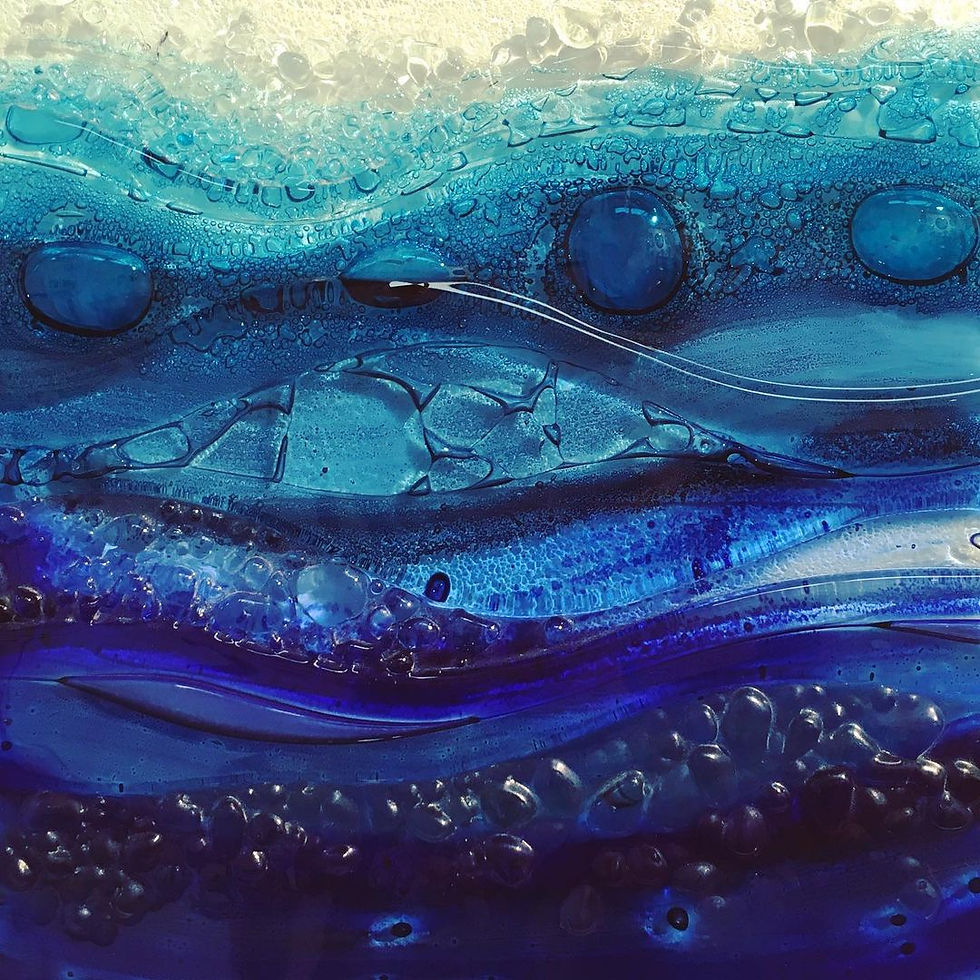 Thumbnail: Contemporary Sennen medium deep dish features copperised  fish motifs swimming against the deep rockpools.