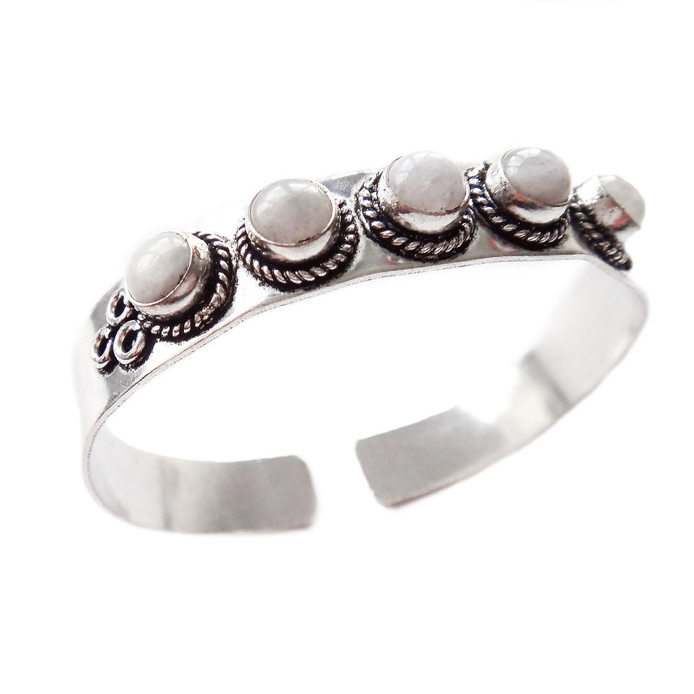 Thumbnail: Moonstone open-end Bangle featuring five white moonstones with detailing  surrounding each round gemstone and on each end.