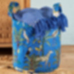 Vibrant blue jungle print storage laundry bags with two carry handles and interlined.